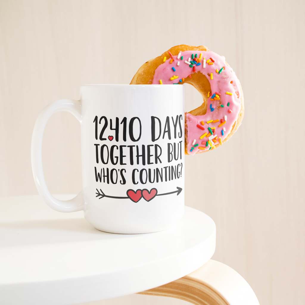 4008731356_15ozWhiteMugLifetsyleDonutLH_Mockup.png_15505947