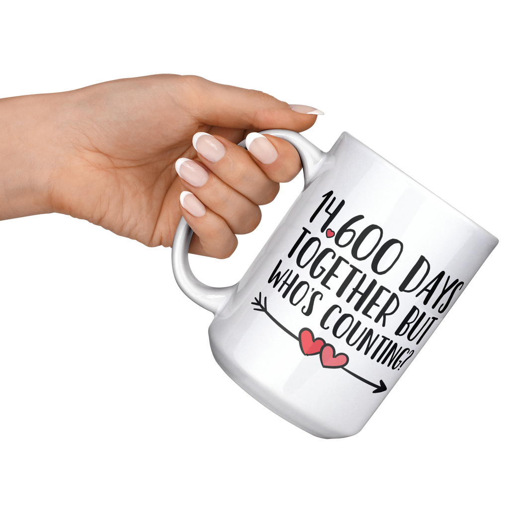 40th_Anniversary_Coffee_Mug_14600_Days__15ozWhiteMugLifestyleLHRaisedAngle_Mockup.png_15649612