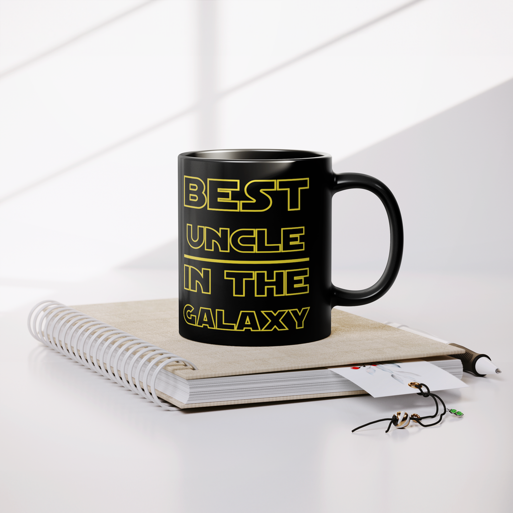 Best_Uncle_In_The_Galaxy_Ceramic_Mug_Lifestyle_Notebook_Mockup.png_15879071