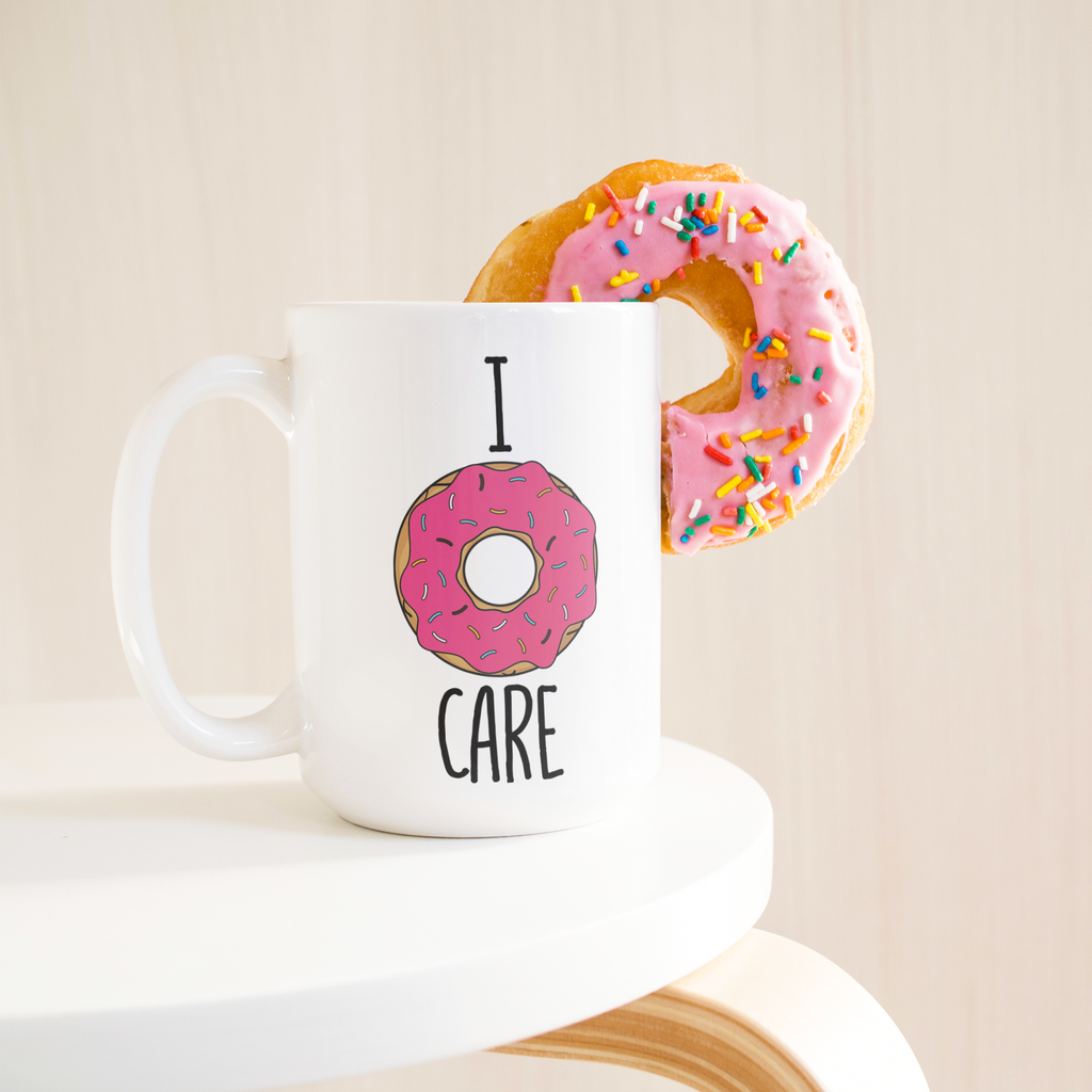 I_donut_care_15ozWhiteMugLifetsyleDonutLH_Mockup.png_15673598