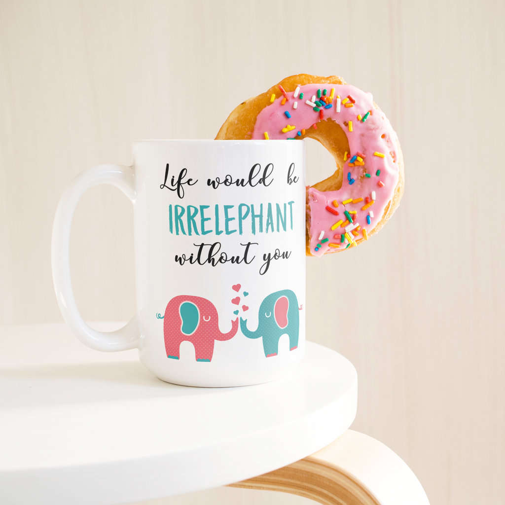Irrelephant_15ozWhiteMugLifetsyleDonutLH_Mockup.png_15767167