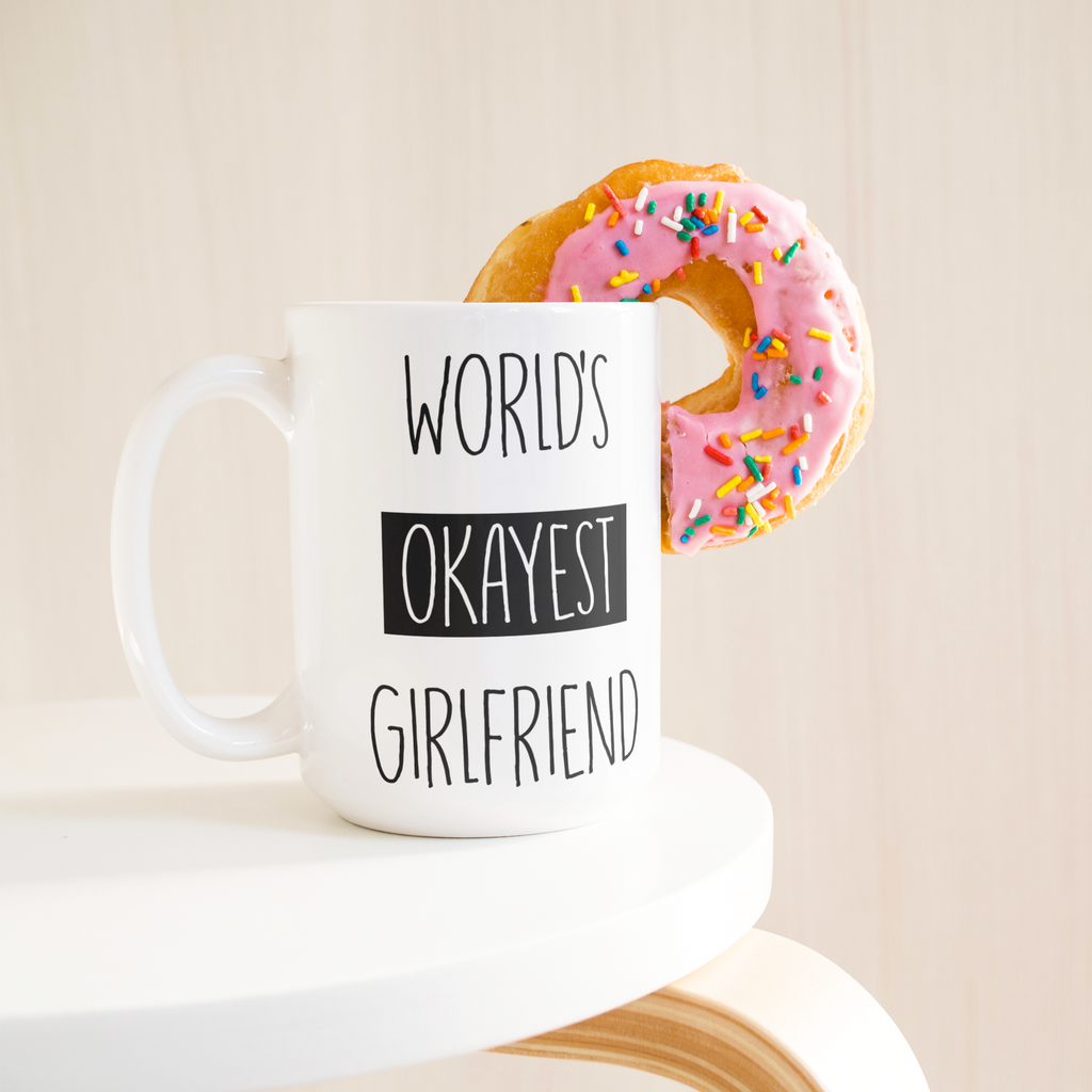 Okayest_Girlfriend_15ozWhiteMugLifetsyleDonutLH_Mockup.png_15664920