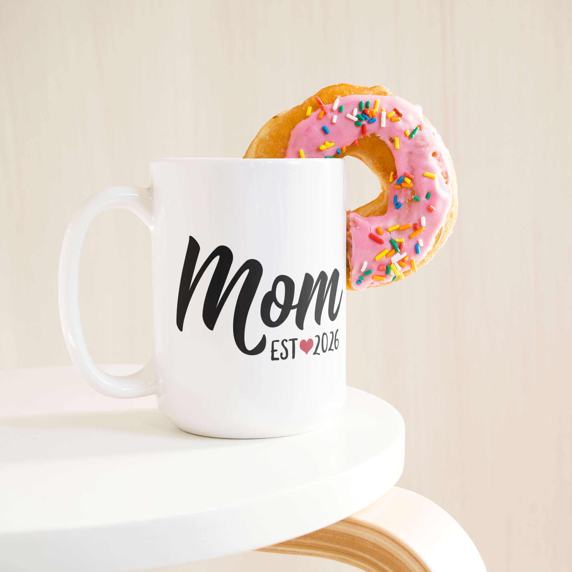 test_15ozWhiteMugLifetsyleDonutLH_Mockup.png_15586706