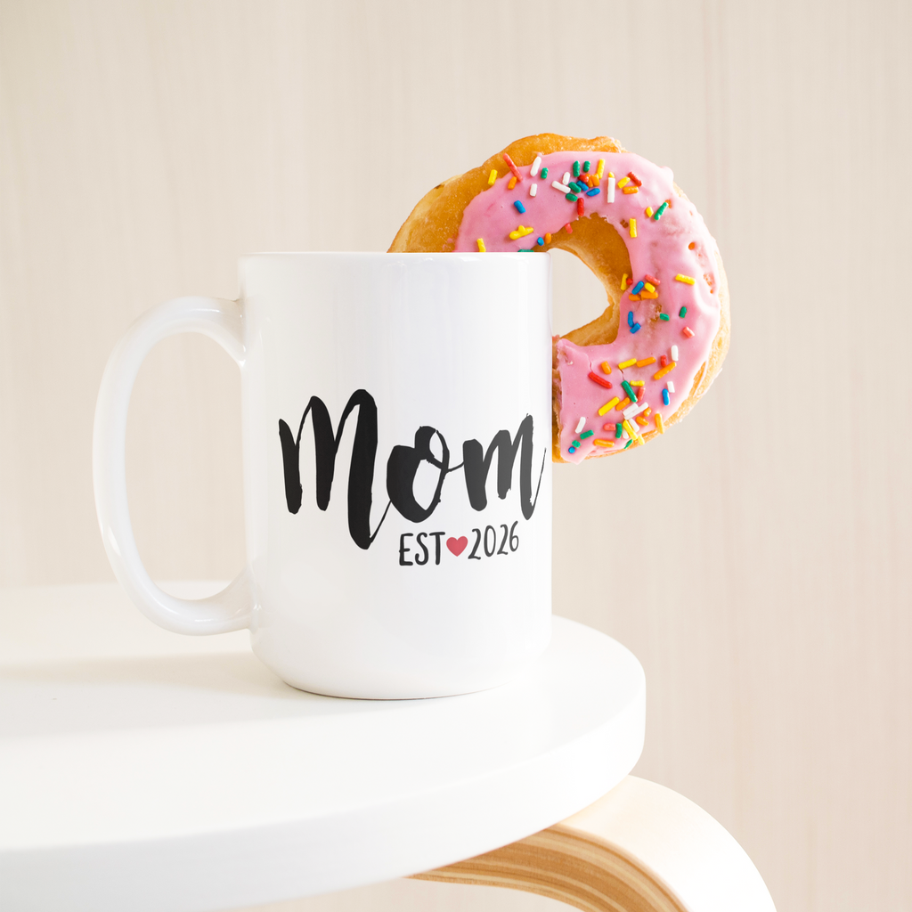 test_mockup_mom_15ozWhiteMugLifetsyleDonutLH_Mockup.png_15584989