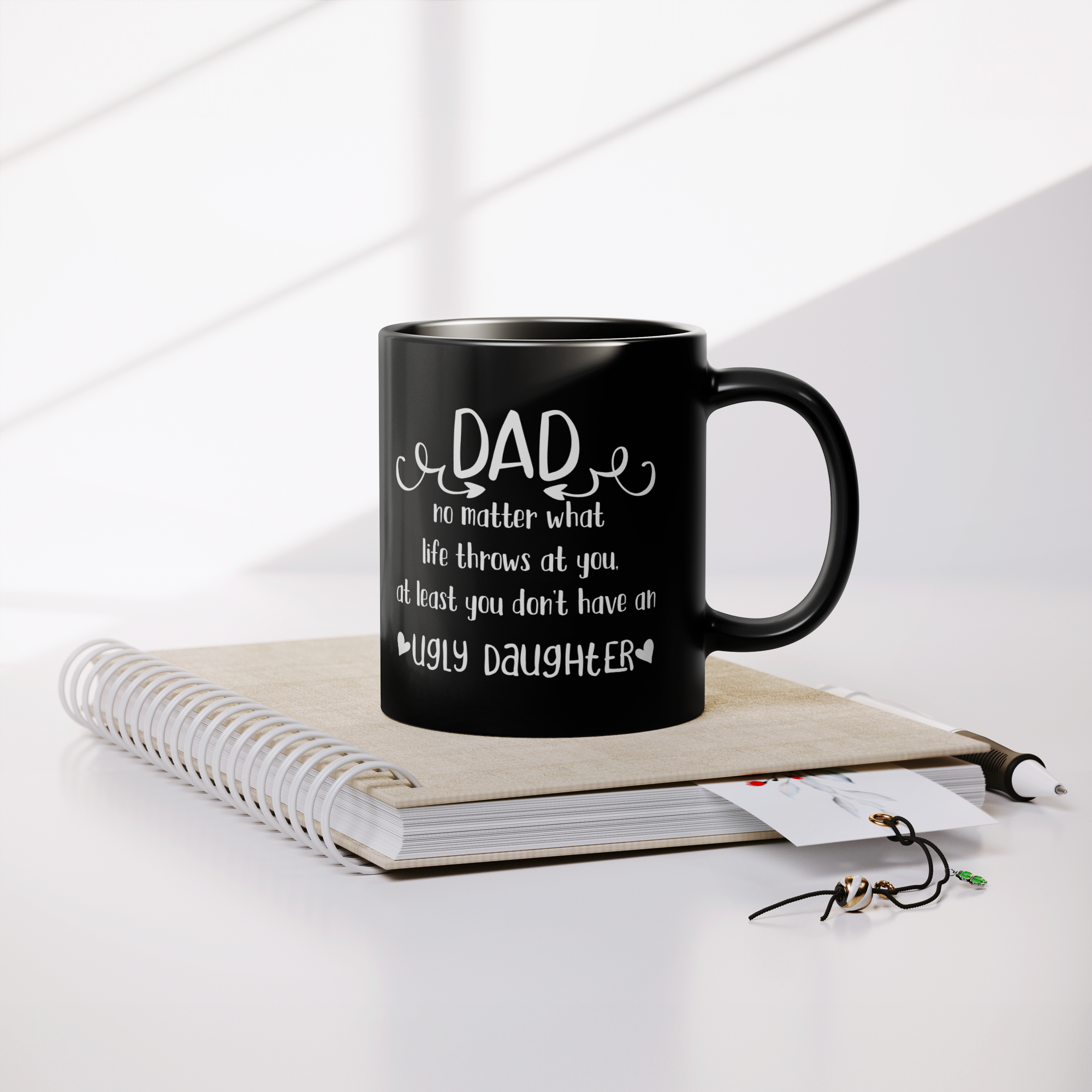 unny_Ugly_Daughter_11oz_Lifestyle_Notebook_Mockup.png_15812400